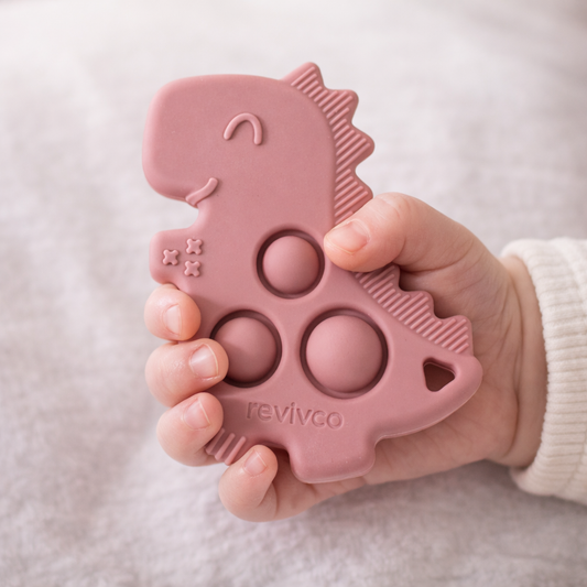POP Dino teether — premium silicone teether for active babies with sore gums